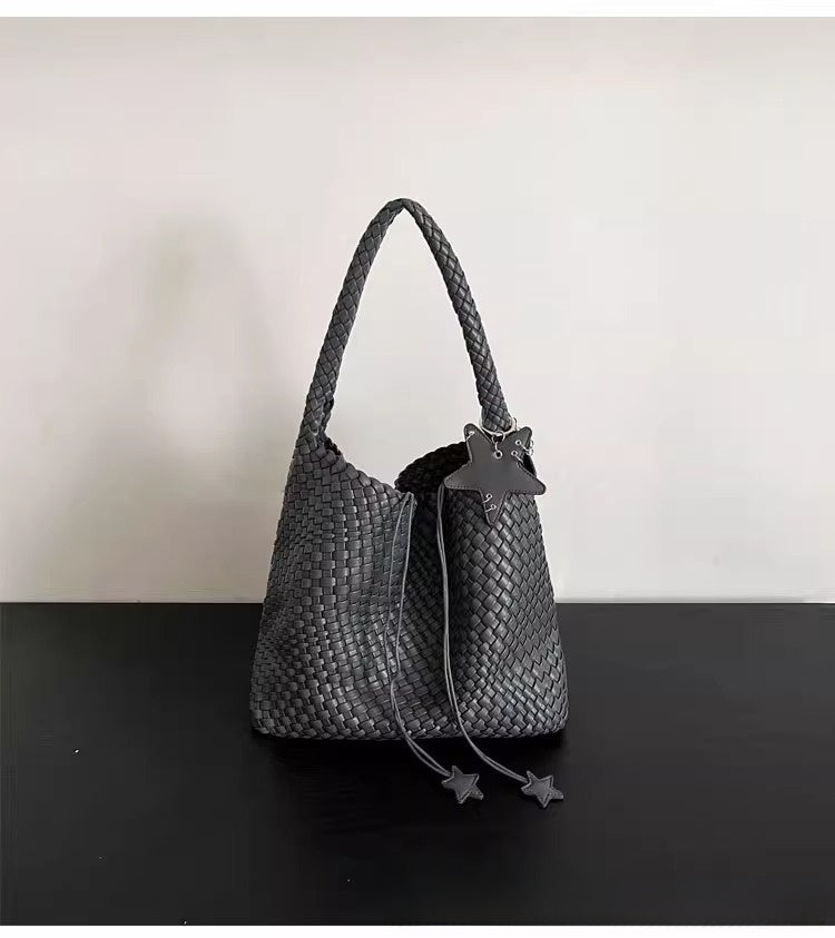 Champagne-colored woven tote bag