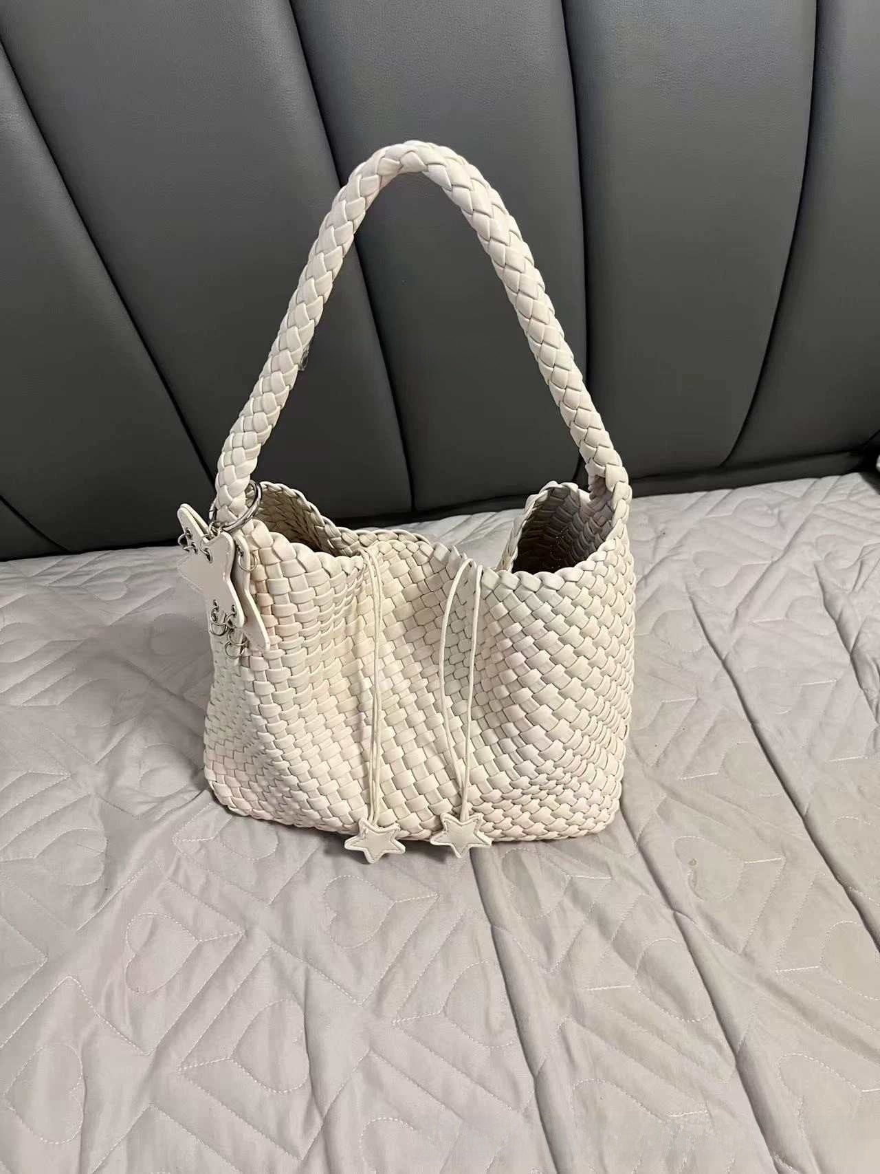 Champagne-colored woven tote bag