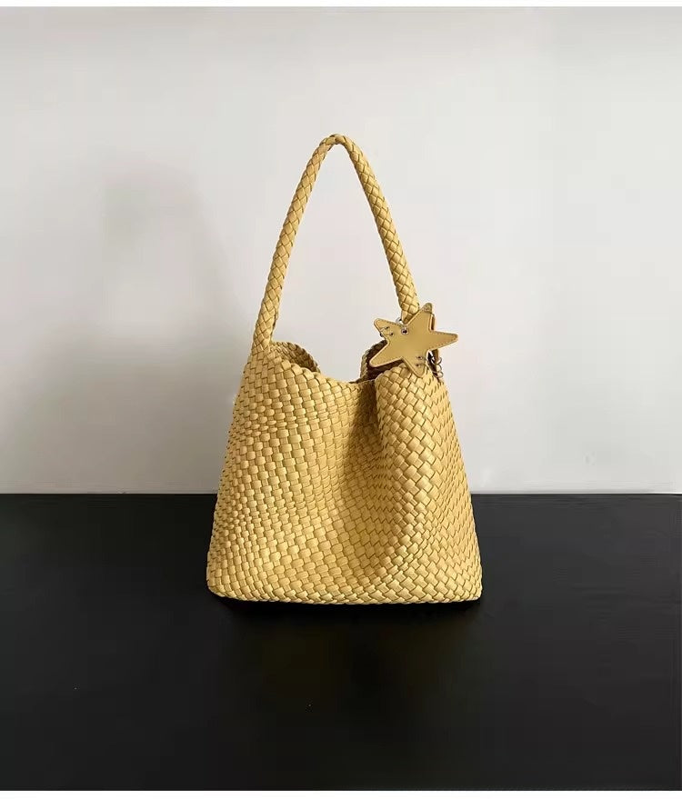 Champagne-colored woven tote bag