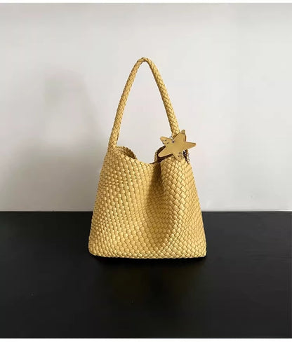 Champagne-colored woven tote bag