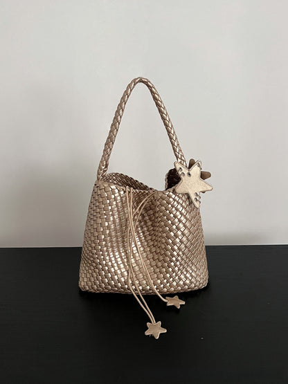 Champagne-colored woven tote bag
