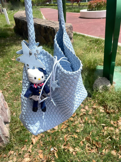 Champagne-colored woven tote bag