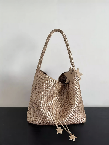 Champagne-colored woven tote bag