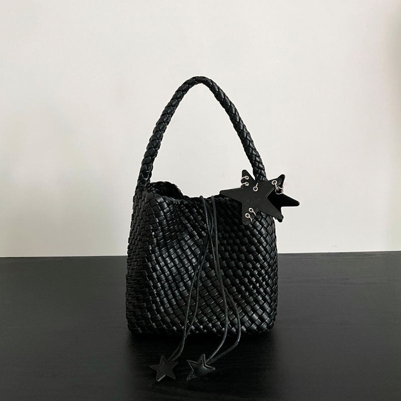 Champagne-colored woven tote bag