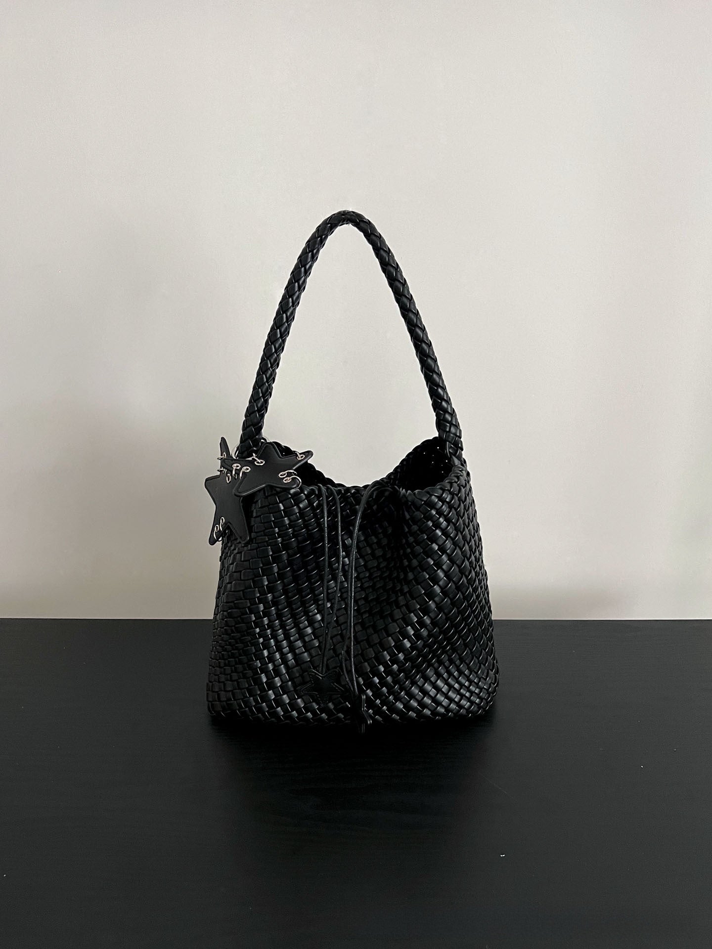 Champagne-colored woven tote bag