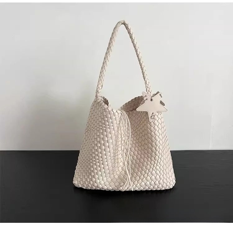 Champagne-colored woven tote bag