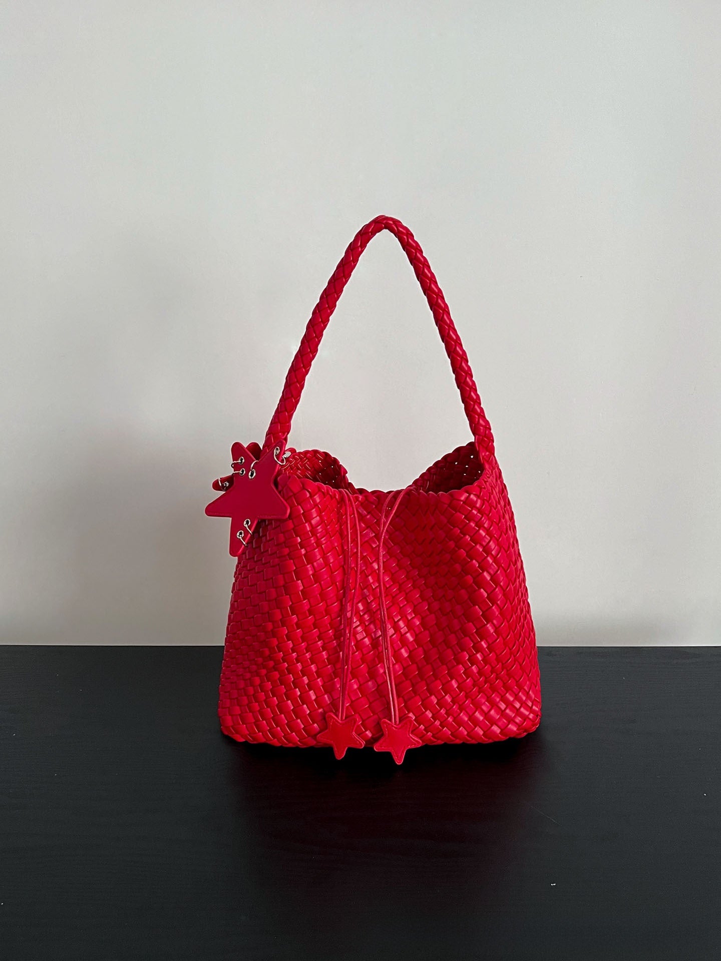Champagne-colored woven tote bag