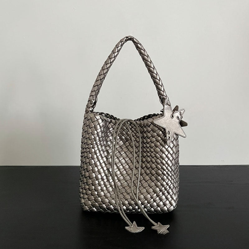 Champagne-colored woven tote bag