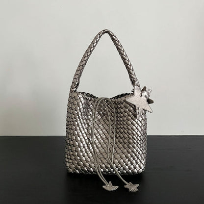 Champagne-colored woven tote bag