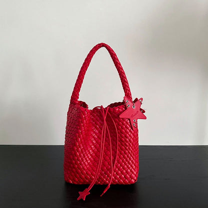 Champagne-colored woven tote bag
