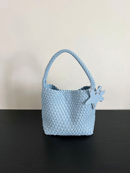 Champagne-colored woven tote bag