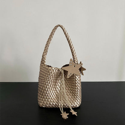 Champagne-colored woven tote bag